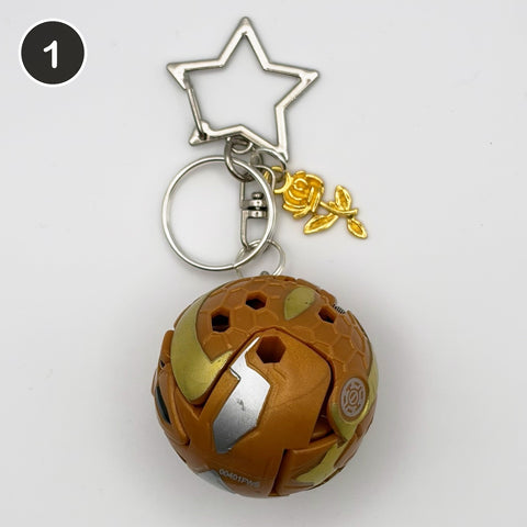 #1 Rosegold Brawler upcycled Bakugan keychain