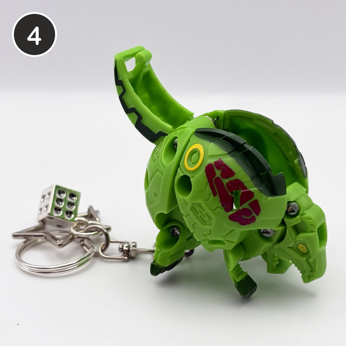 #4 Jackpot Brawler upcycled Bakugan keychain, opened