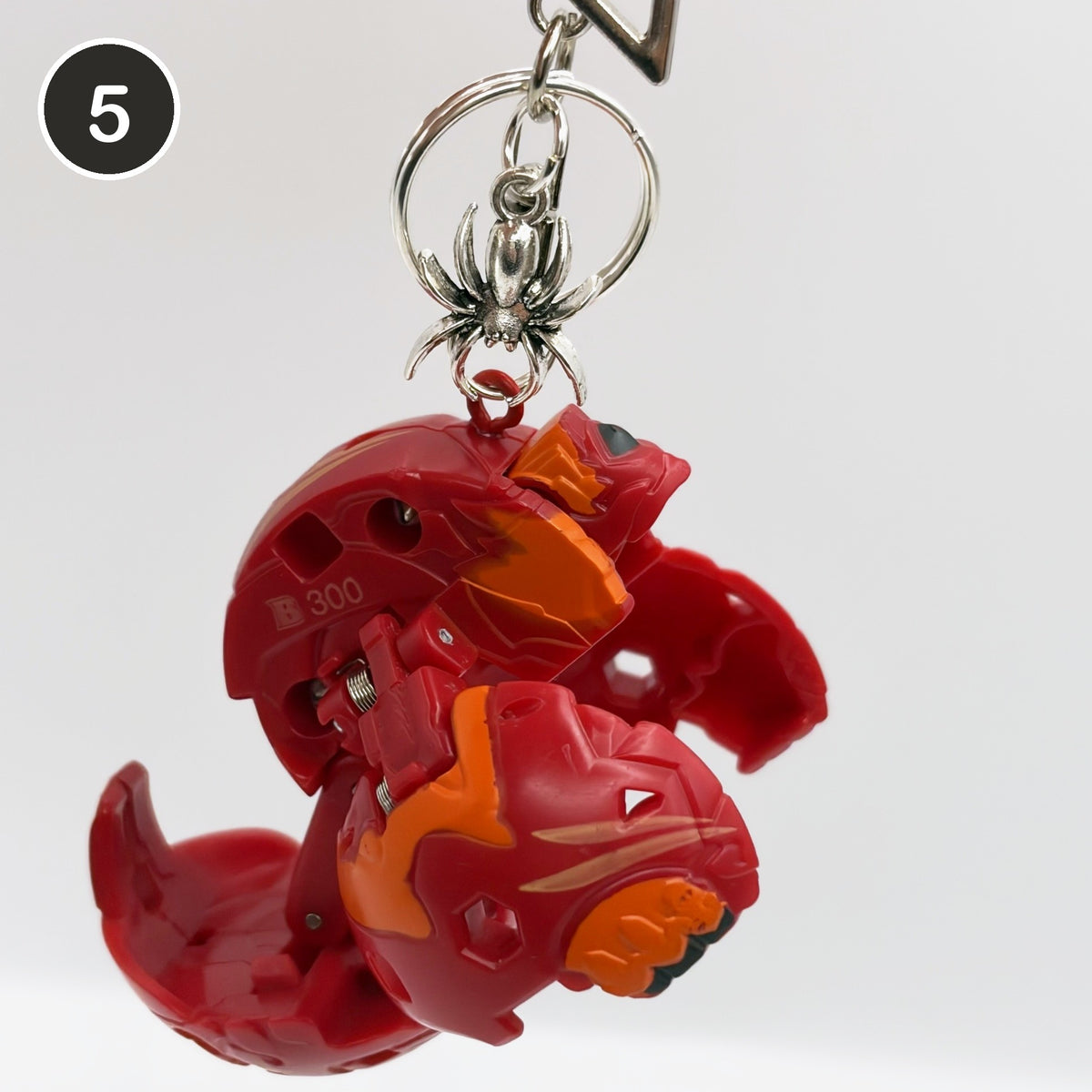 #5 Wildfire Brawler upcycled Bakugan keychain, opened
