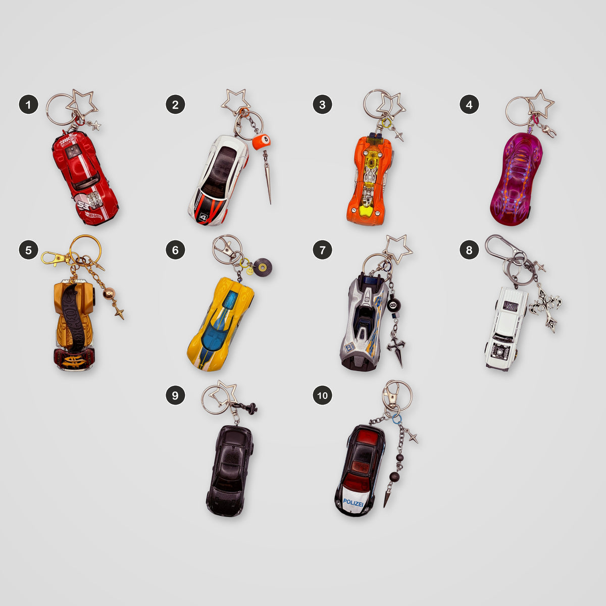 Red & Chrome upcycled Hot Wheels keychains, all designs