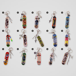 Bright upcycled Tech Deck fingerboard keychains, all designs