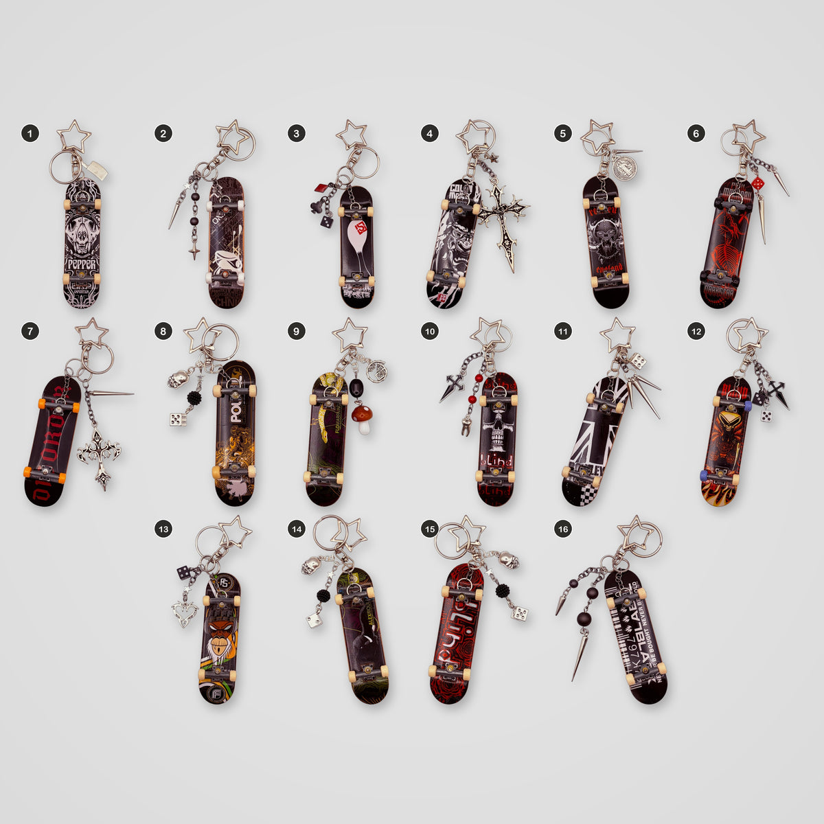 Dark upcycled Tech Deck fingerboard keychains, all designs