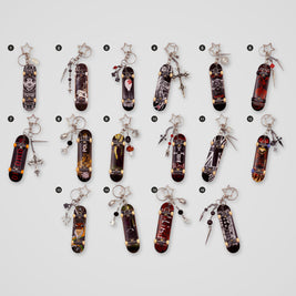 Dark upcycled Tech Deck fingerboard keychains, all designs